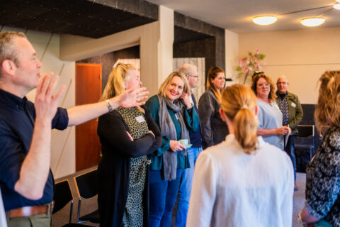 Deelnemers De Professional Centraal staan in een groep